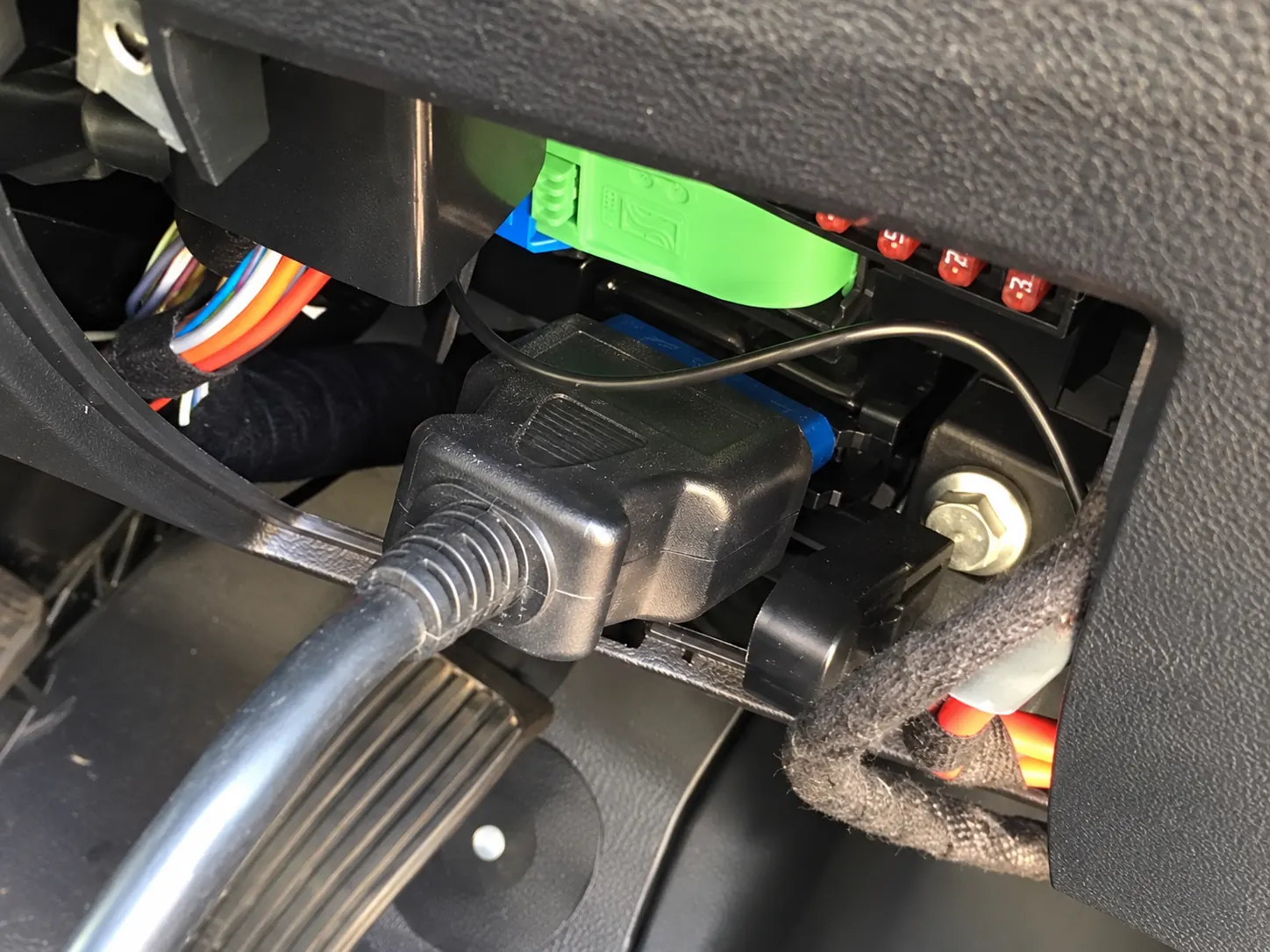 Diagnostic lead plugged into an OBD connector on a Fiat Ducato, Peugeot Boxer or Citroën Relay installation