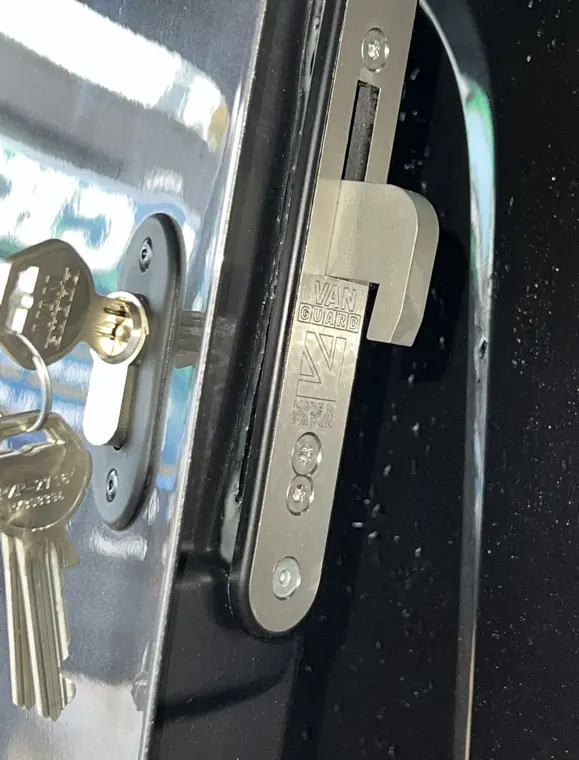 Van Guard hooked bolt and key on a van door