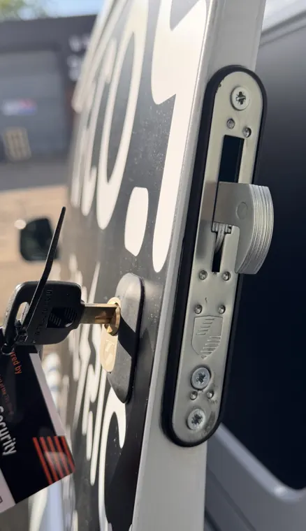Heavy hooklock bolt and keyed cylinder on van door
