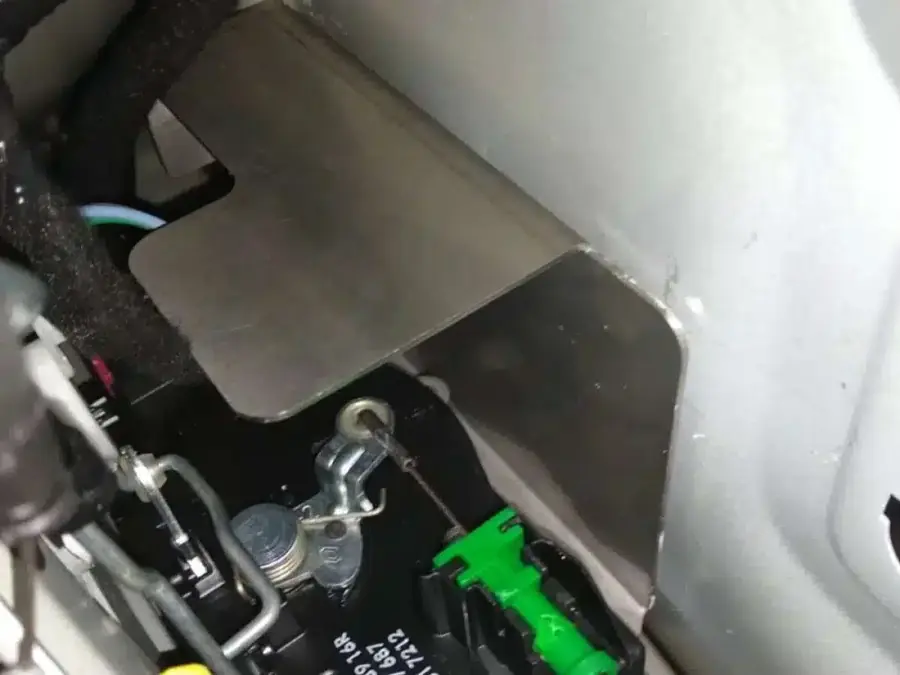 Shield protecting internal latch components